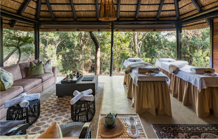 Luxurious spa with massage tables, offering rejuvenating treatments in a tranquil setting.